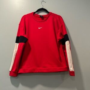 Red Nike sweatshirt with pockets size, small color, black sleeve